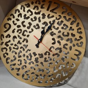 gold Metal clock in a leopard print design
