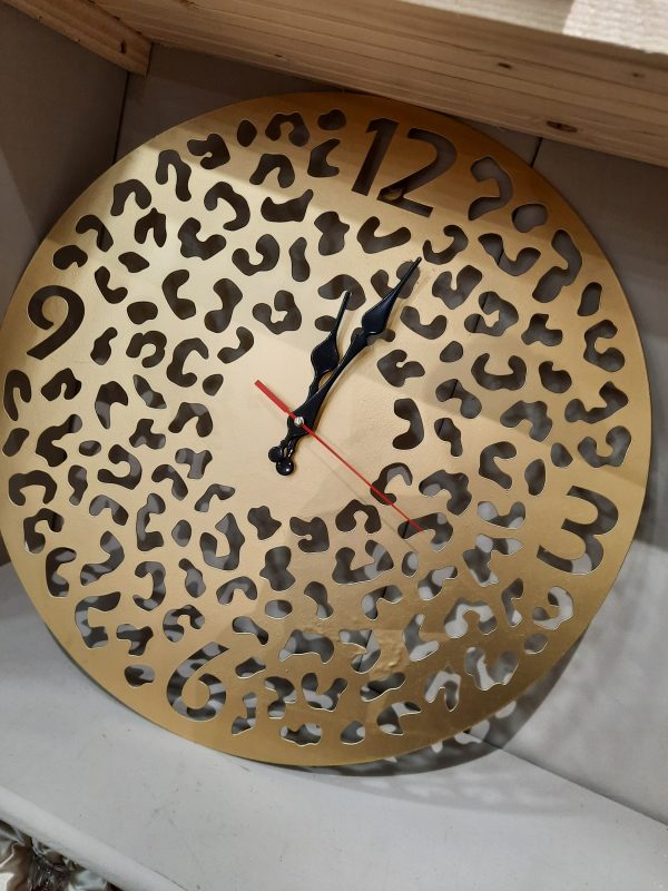 gold Metal clock in a leopard print design