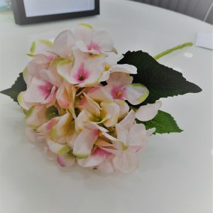 an image of a fake pink hydrangea flower