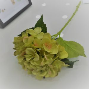 an image of a fake green hydrangea flower