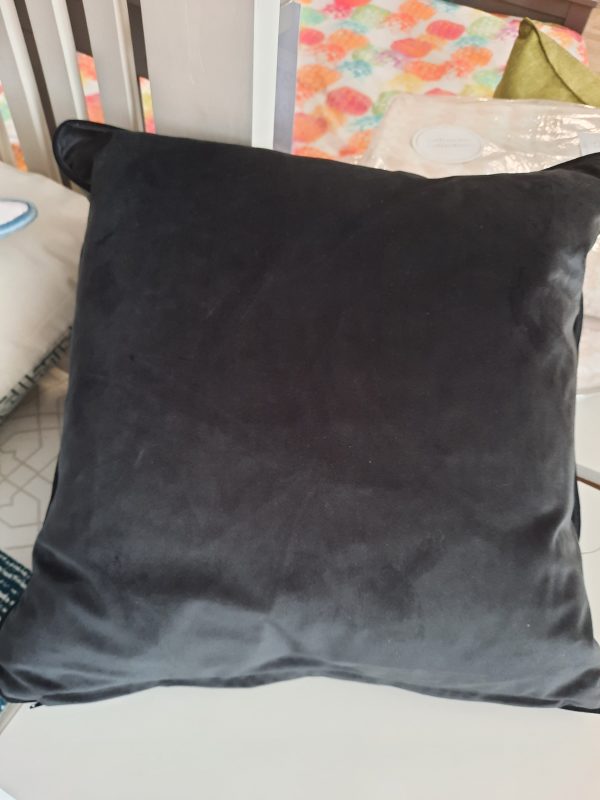 an image of a dark grey velvet cushion back