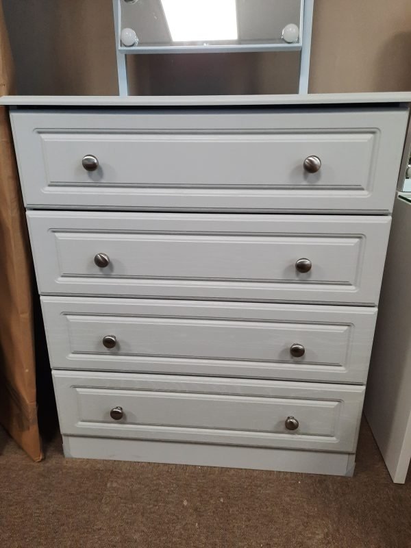 an image of a grey ash 4 drawer chest