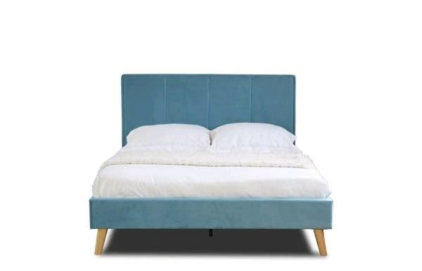 an image of a blue velvet bedframe with gold metal legs