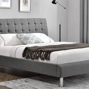 an image of a grey fabric bed