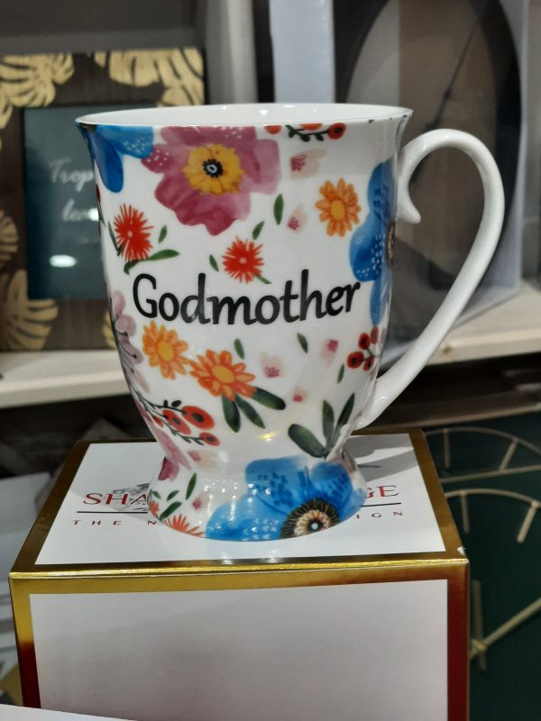an image of a floral mug with godmother written on it