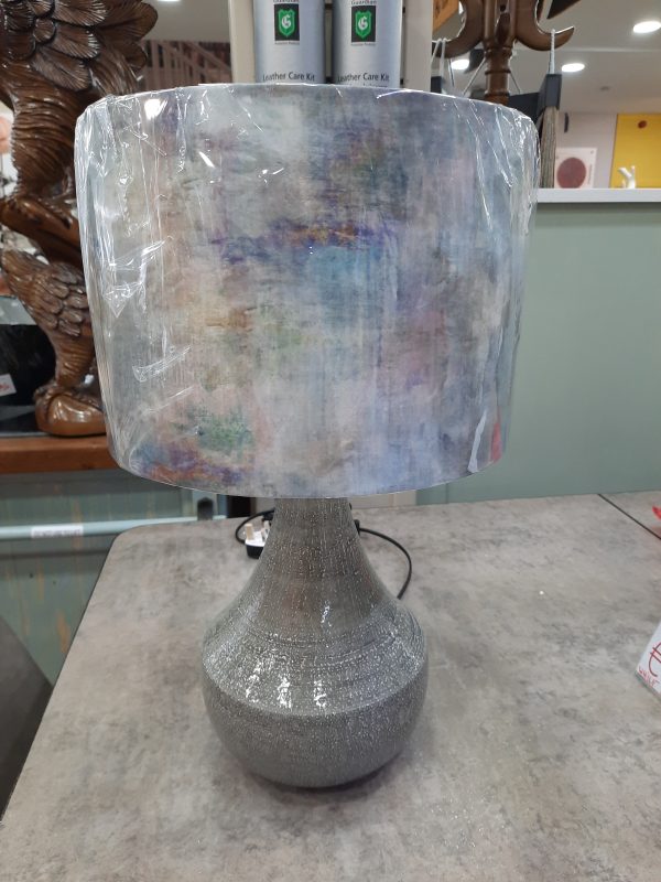 an image of a grey lamp base with a colourful 30cm shade