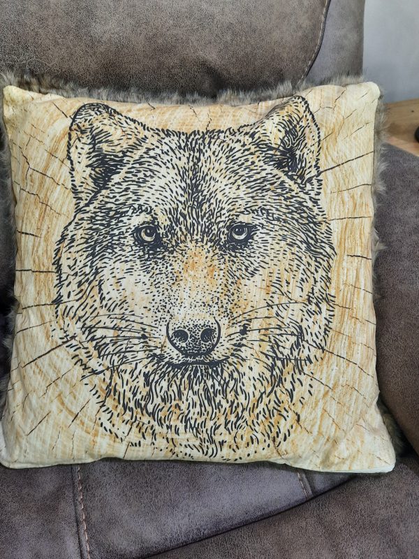 an image of a cushion with a wolf on it