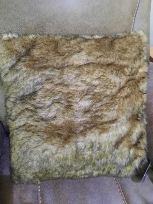 an image of a brown faux fur cushion
